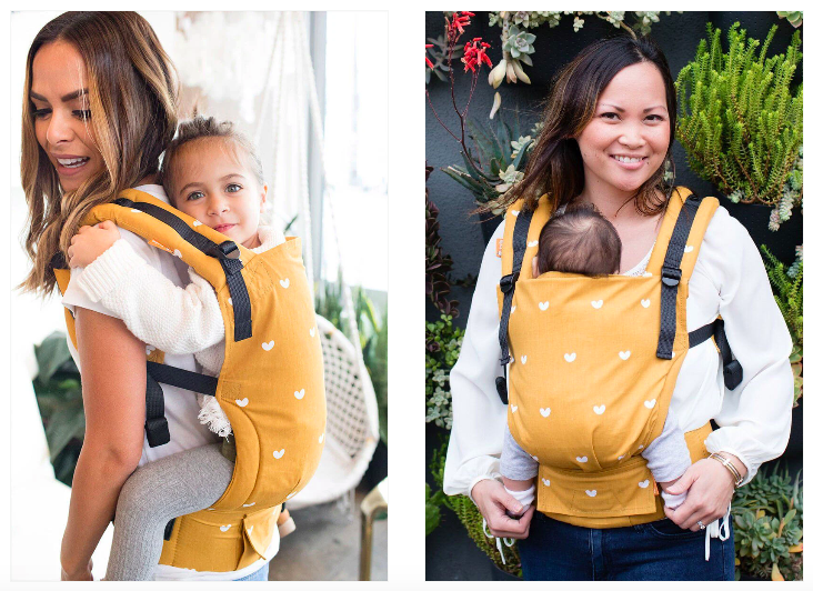 Baby Carrier: Tula carrier in a vibrant pattern being worn by a parent.