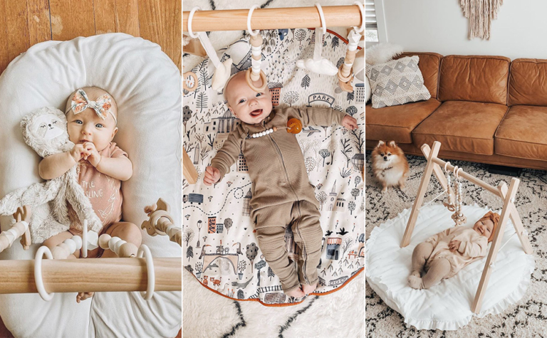 Baby Play Gym: Image of babies playing under wooden play gym.