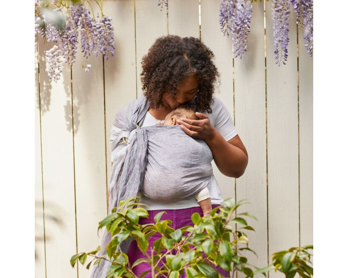 LÍLLÉbaby Sling: Examples of ring slings and pouch slings with a parent carrying a baby.