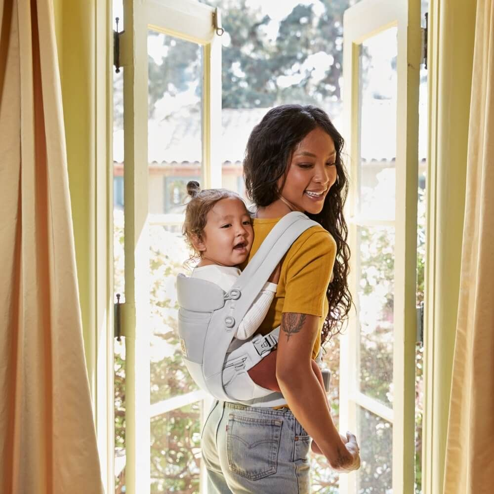 Baby Carrier - image of a mother an her daughter using baby carrier.
